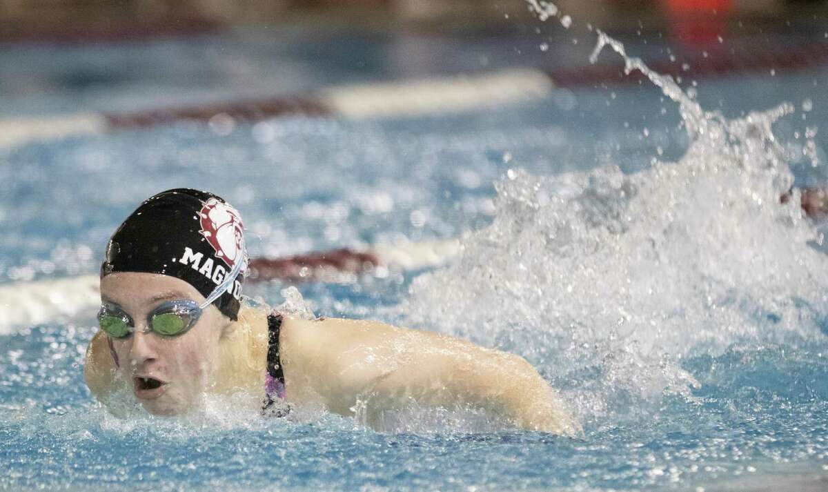 Magnolia freshman Sierra Tice competes in the girls 100 yard butterfly event during the Region VI-5A championships Saturday, Feb. 2, 2019 at the Michael D. Holland Aquatic Center in Magnolia.