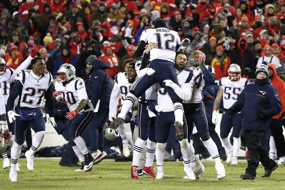 KANSAS CITY, MISSOURI - JANUARY 20: Tom Brady #12 of the New England Patriots celebrates with teammates after defeating the Kansas City Chiefs during the AFC Championship Game at Arrowhead Stadium on January 20, 2019 in Kansas City, Missouri. The New England Patriots defeated the Kansas City Chiefs 37-31. (Photo by Jamie Squire/Getty Images)