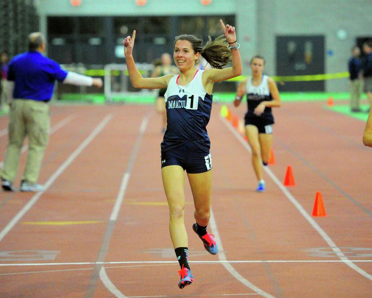 Immaculate's Taylor Mascetta crosses the finish line in the 1600 meter run during SWC Indoor Track and Field Championship action in New Haven, Conn., on Saturday Feb. 2, 2019.