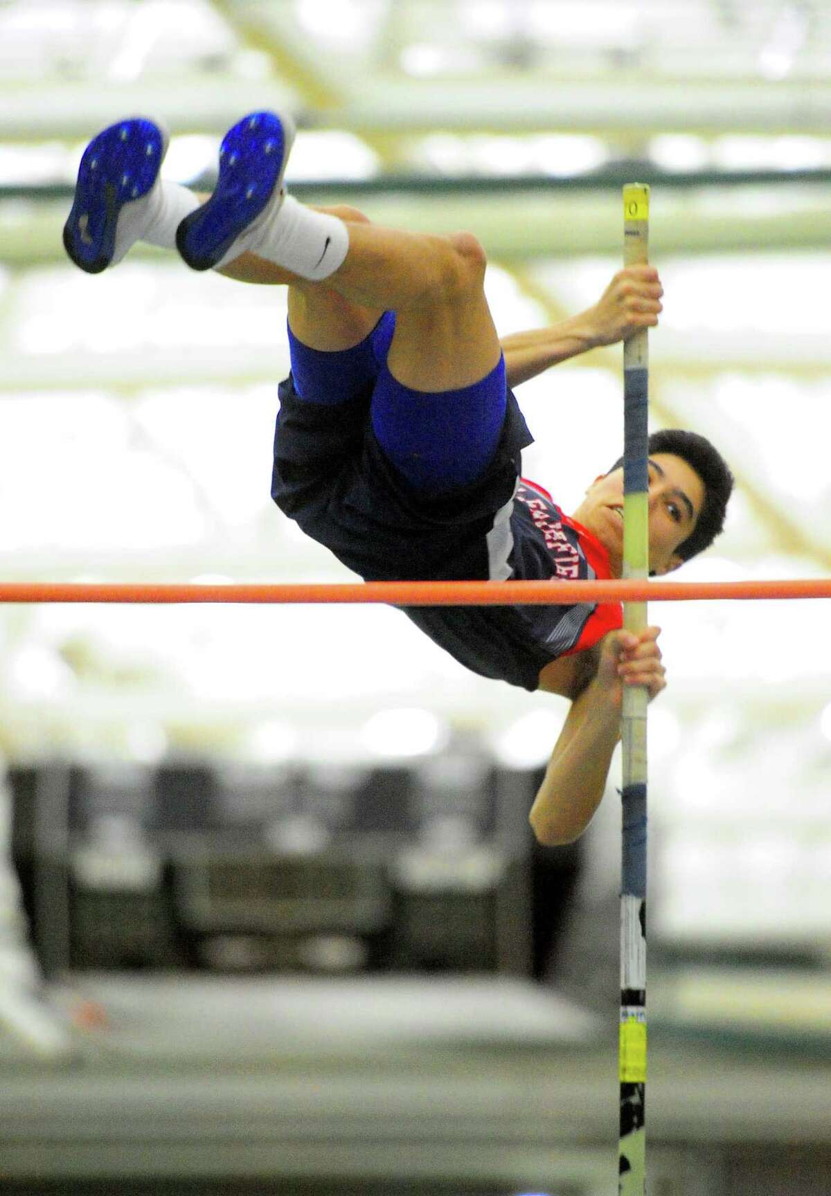 New Fairfield’s David Murphy competes in the pole vault during the SWC Indoor Track and Field Championships in New Haven on Saturday.