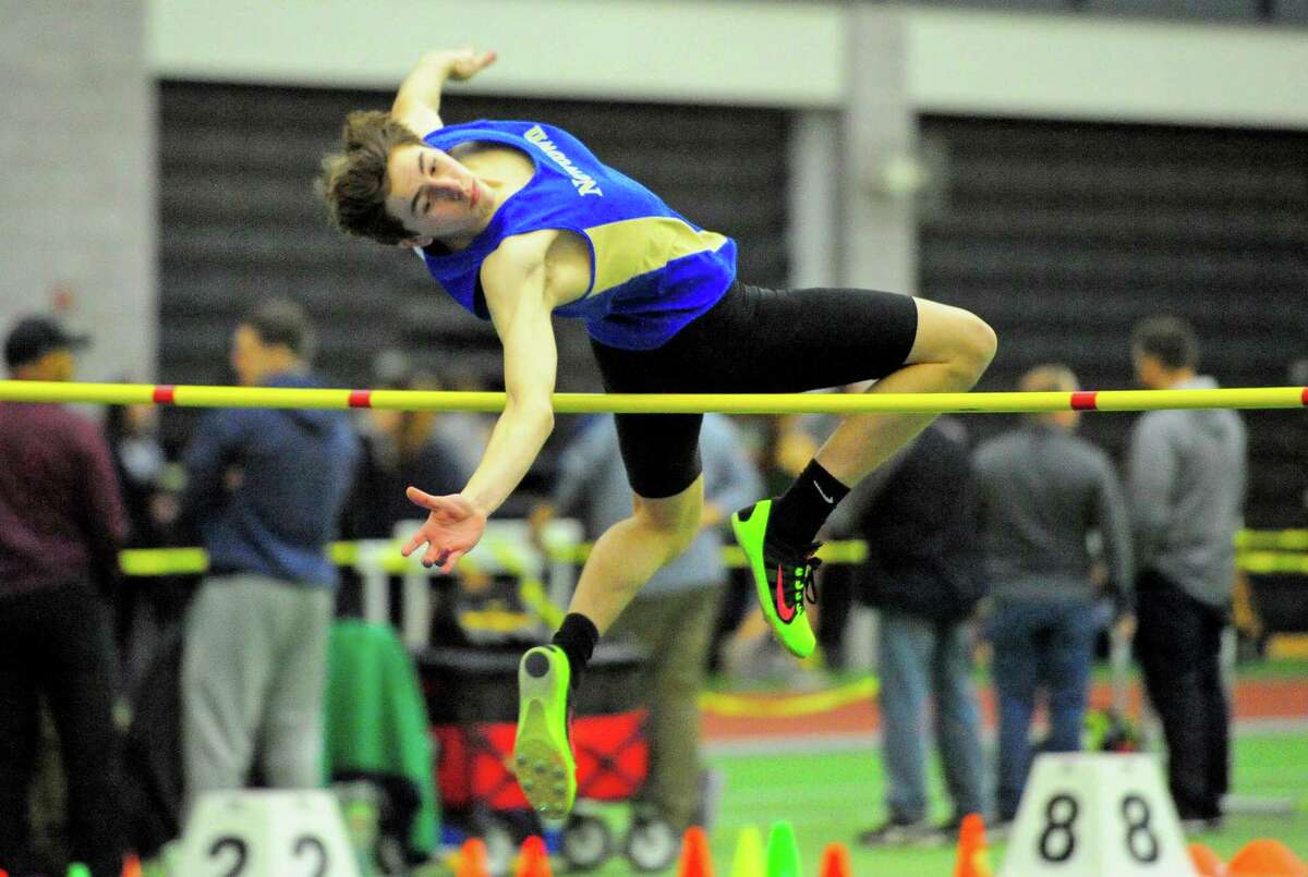 Newtown's Tristan Andrew competes in the high jump during SWC Indoor Track and Field Championship action in New Haven, Conn., on Saturday Feb. 2, 2019.