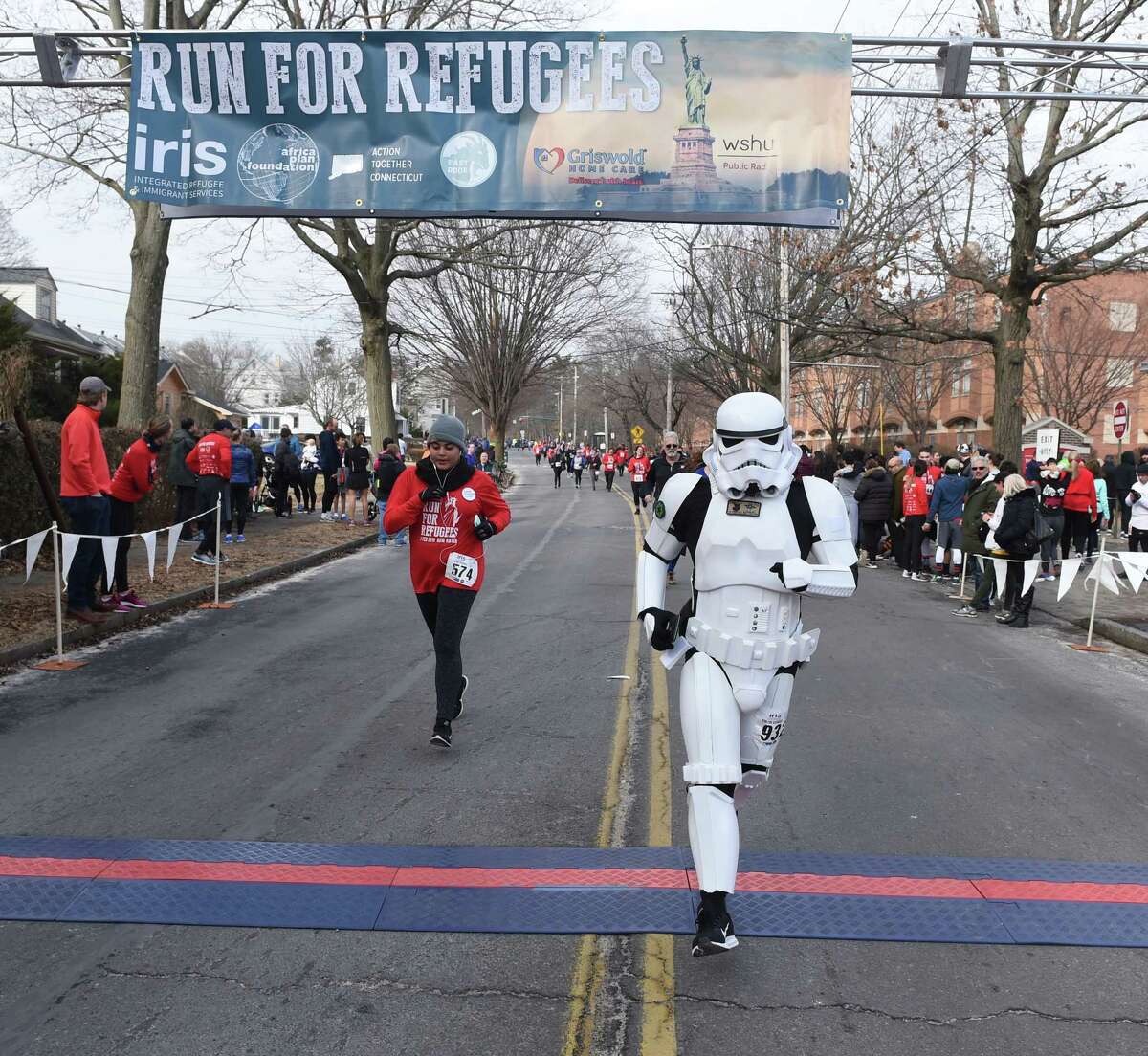 Thousands run in the 12th Annual IRIS Run for Refugees 5K in New Haven on February 3, 2019.