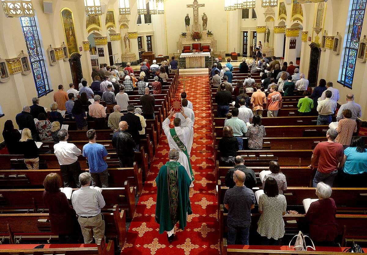 Congregants attend Saturday evening mass at St. Anne's Catholic Church in Beaumont. Area churches, clergy and parishioners continue to grapple with last week's naming of priests within the diocese who were accused of sexual misconduct. Photo taken Saturday, February 2, 2019 Photo by Kim Brent/The Enterprise