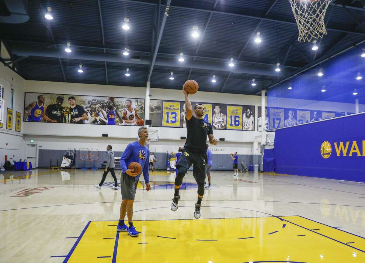 Stephen Curry warms up during a Warriors practice. Music selections are often associated with where the team is going to play, such as tunes by Kendrick Lamar and Dr. Dre when in L.A.