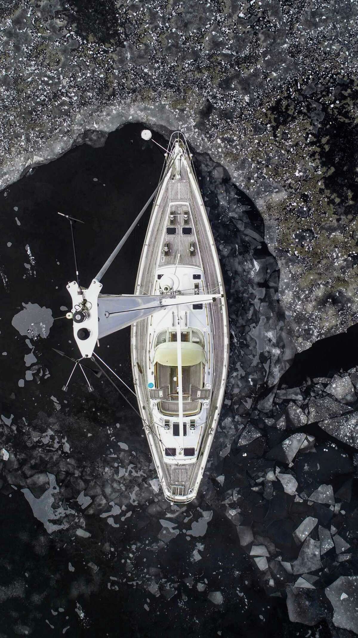 Amateur photographer Frank Dinardi of East Haddam captured before and after shots and drone video of a 52-foot sailing yacht which sunk late last month in Hamburg Cove in Lyme. His dramatic video, which has garnered more than 141,000 hits on YouTube, has inspired great interest in the “mysterious” incident.