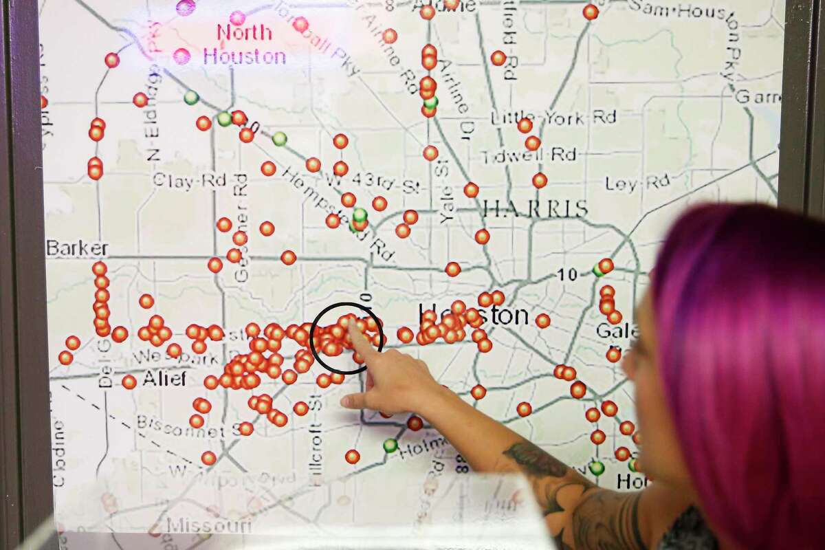 Elijah Rising interventions director Vanessa Forbes points out locations of illegal brothels in Houston at their Museum of Modern-Day Slavery Thursday Oct. 11, 2018. The museum is housed in a former brothel and contains human trafficking artifacts and replicas of rooms and locations that have been used in sex trafficking.