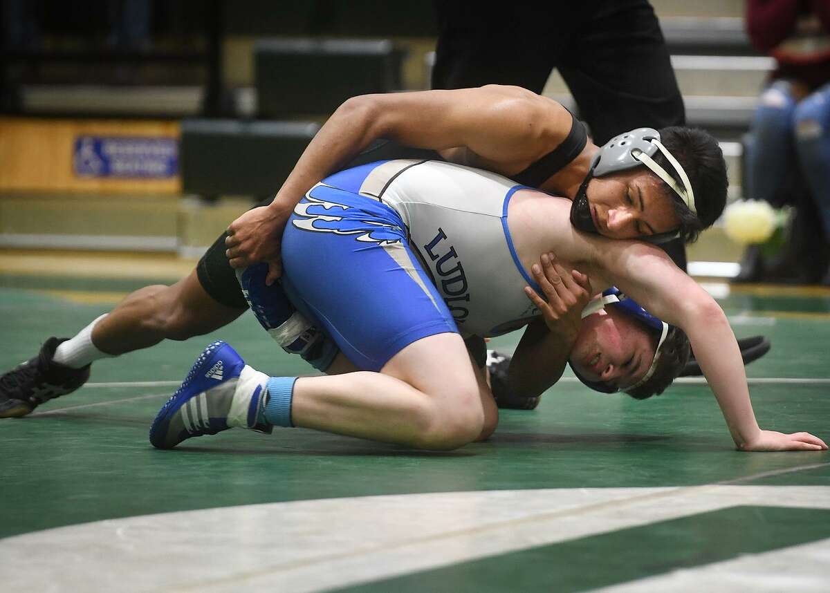 Norwalk's Cesar Rivera, top, defeats Fairfield Ludlowe's Sean Zimmerman in the 138 pound match during a wrestling meet between the two FCIAC schools at Norwalk High School in Norwalk, Conn. on Monday, February 4, 2019.