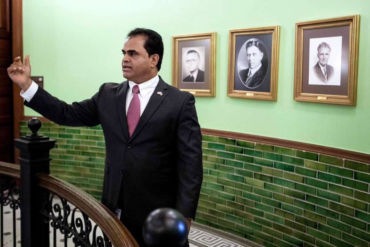 Fort Bend County Judge KP George, shown in this file photo as he walks through the hall at the Fort Bend County Courthouse, has endorsed an idea to form a committee to address a revenue shortfall in the county.