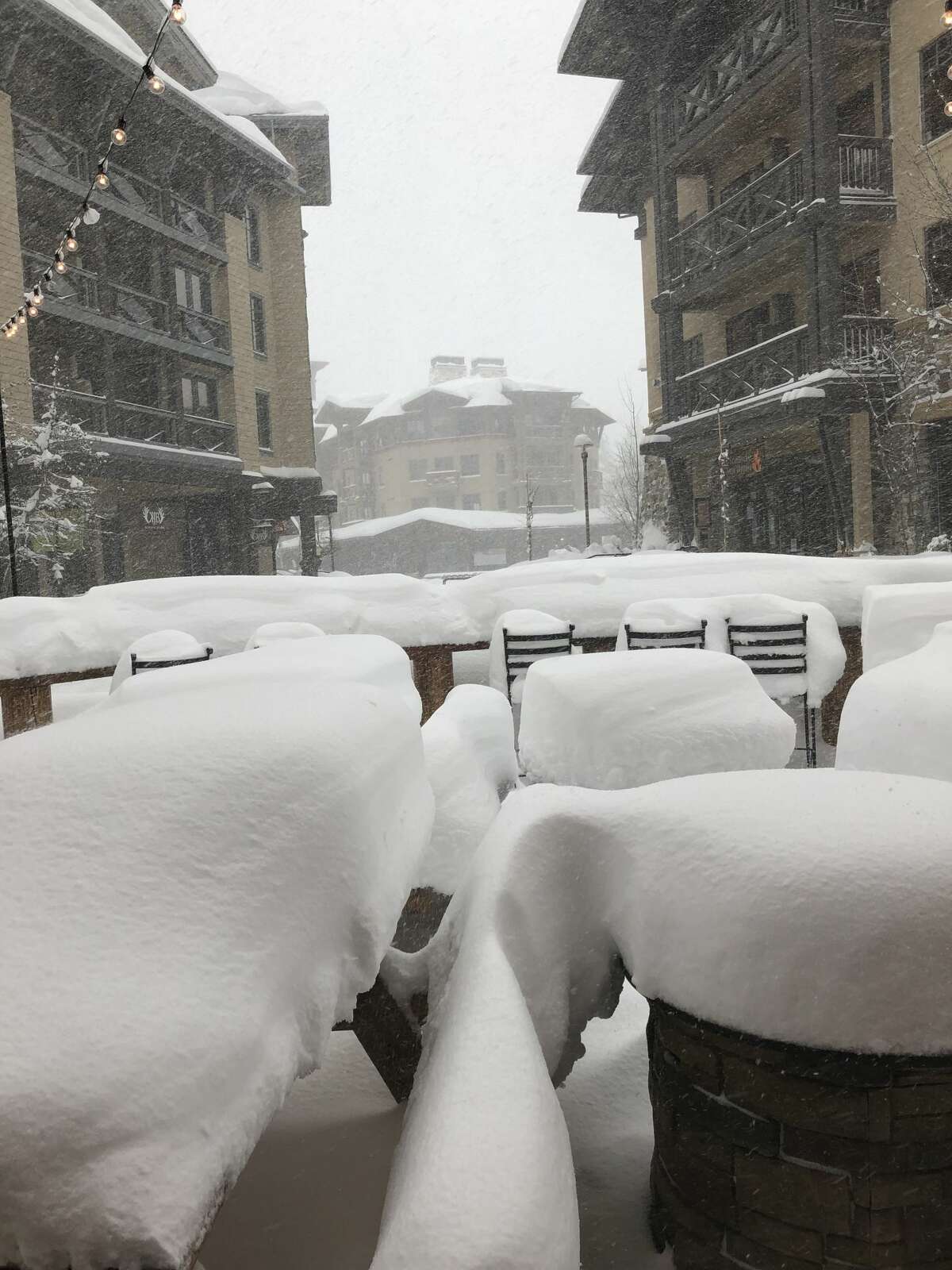 S. Lake Tahoe snowplow hits totally buried car, finds woman inside