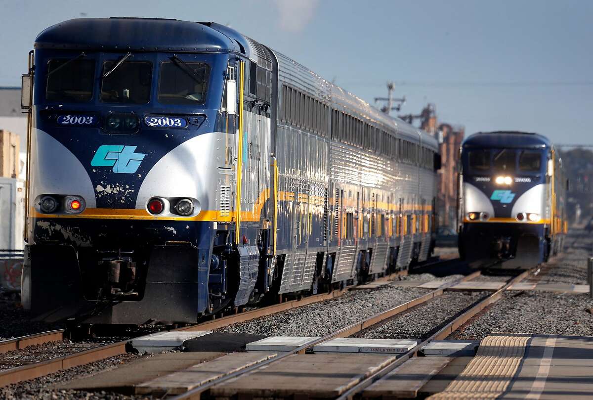 Capitol Corridor trains heading in opposite directions arrive and depart from the Amtrak station in Berkeley, Calif. on Thursday, May 10, 2018. Improvements to the Capitol Corridor's infrastructure would be upgraded if voters approve Regional Measure 3 which would raise area bridge tolls, except on the Golden Gate Bridge, which would fund transportation projects throughout the Bay Area.