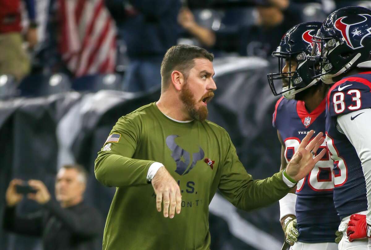 HOUSTON, TX - NOVEMBER 26: Houston Texans tight end coach Tim Kelly warms up players during the football game between the Tennessee Titans and Houston Texans on November 26, 2018 at NRG Stadium in Houston, Texas. (Photo by Leslie Plaza Johnson/Icon Sportswire via Getty Images)