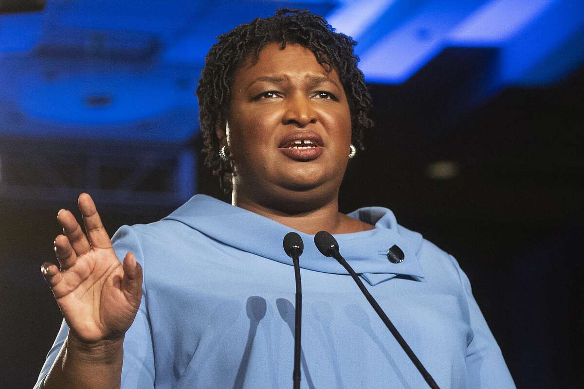 FILE - In this Nov. 6, 2018 file photo, then Georgia Democratic gubernatorial candidate Stacey Abrams addresses supporters during an election night watch party in Atlanta. Abrams will deliver her party’s response to President Trump’s State of the Union by arguing for a more unified society that gives every American a chance at prosperity. (AP Photo/John Amis)