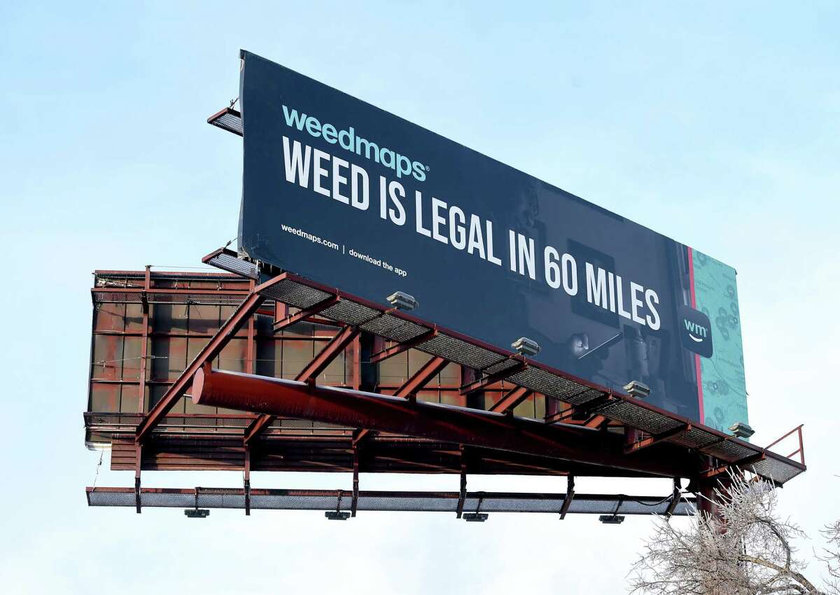 A billboard advertising marijuana in Massachusetts faces travelers on northbound Interstate 91 in New Haven.