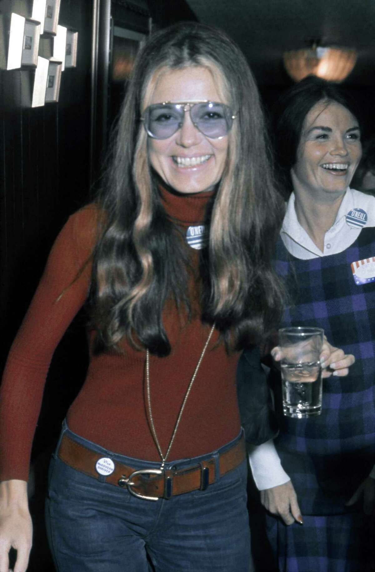 LOS ANGELES - OCTOBER 15: Activist, journalist and leader of the feminist movement Gloria Steinem attends a fundraiser and rally for California State Senate candidate Catherine O'Neill (in Checked dress) at actor Lorne Greene's house on October 15, 1972 in Los Angeles, California. (Photo by Michael Ochs Archives/Getty Images)