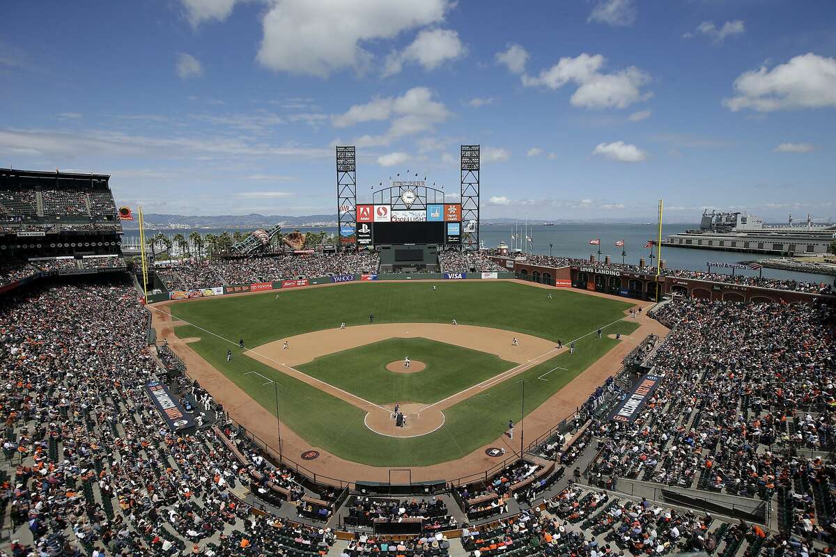 FILE - This June 15, 2016, file photo shows AT&T Park from an overhead view as the San Francisco Giants play the Milwaukee Brewers during a baseball game in San Francisco. The Oakland Raiders are in talks with the Giants about playing their home games next season at Oracle Park, formerly known as AT&T Park. A person with knowledge of the negotiations said Sunday night, Feb. 3, 2019, the two sides are in discussions, but no deal has been reached. The person spoke to The Associated Press on condition of anonymity because nothing has been finalized. (AP Photo/Marcio Jose Sanchez, File)