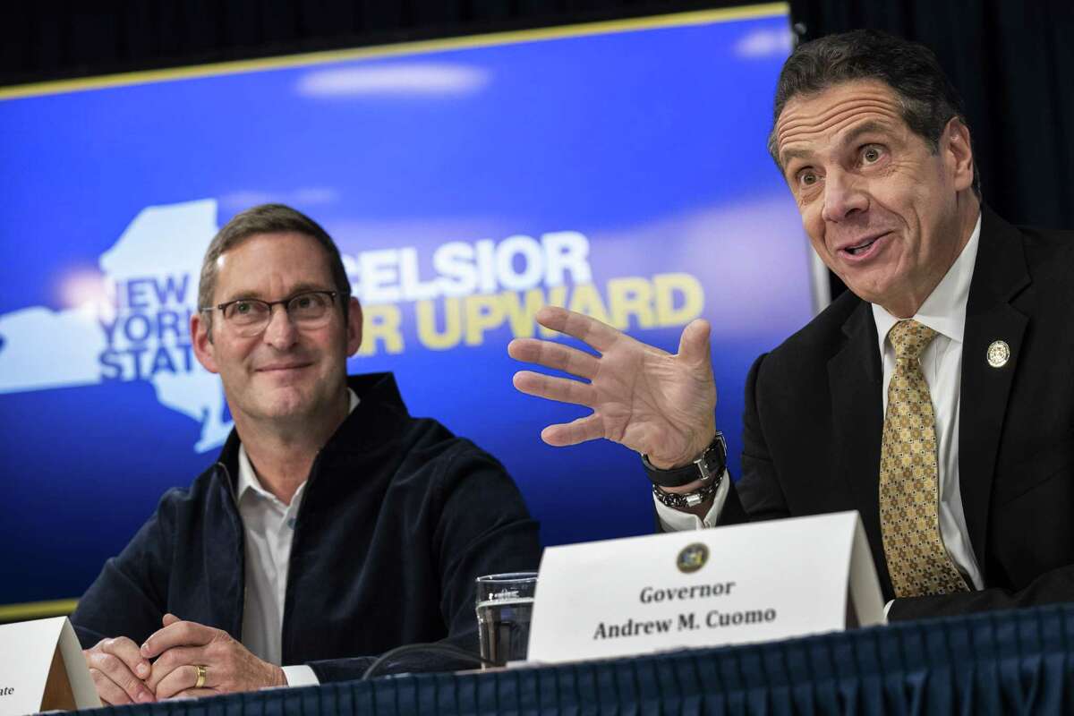 NEW YORK, NY - NOVEMBER 13: (L-R) John Schoettler, Vice President for Global Real Estate at Amazon, looks on as New York Governor Andrew Cuomo speaks during a press conference to discuss Amazon's decision to bring a new corporate location to New York City, November 13, 2018 in New York City. Amazon announced earlier in the day that it has chosen Arlington, Virginia and Long Island City in Queens as the two locations, which will both serve as additional headquarters for the company. Amazon says each location will create 25,000 jobs. (Photo by Drew Angerer/Getty Images)