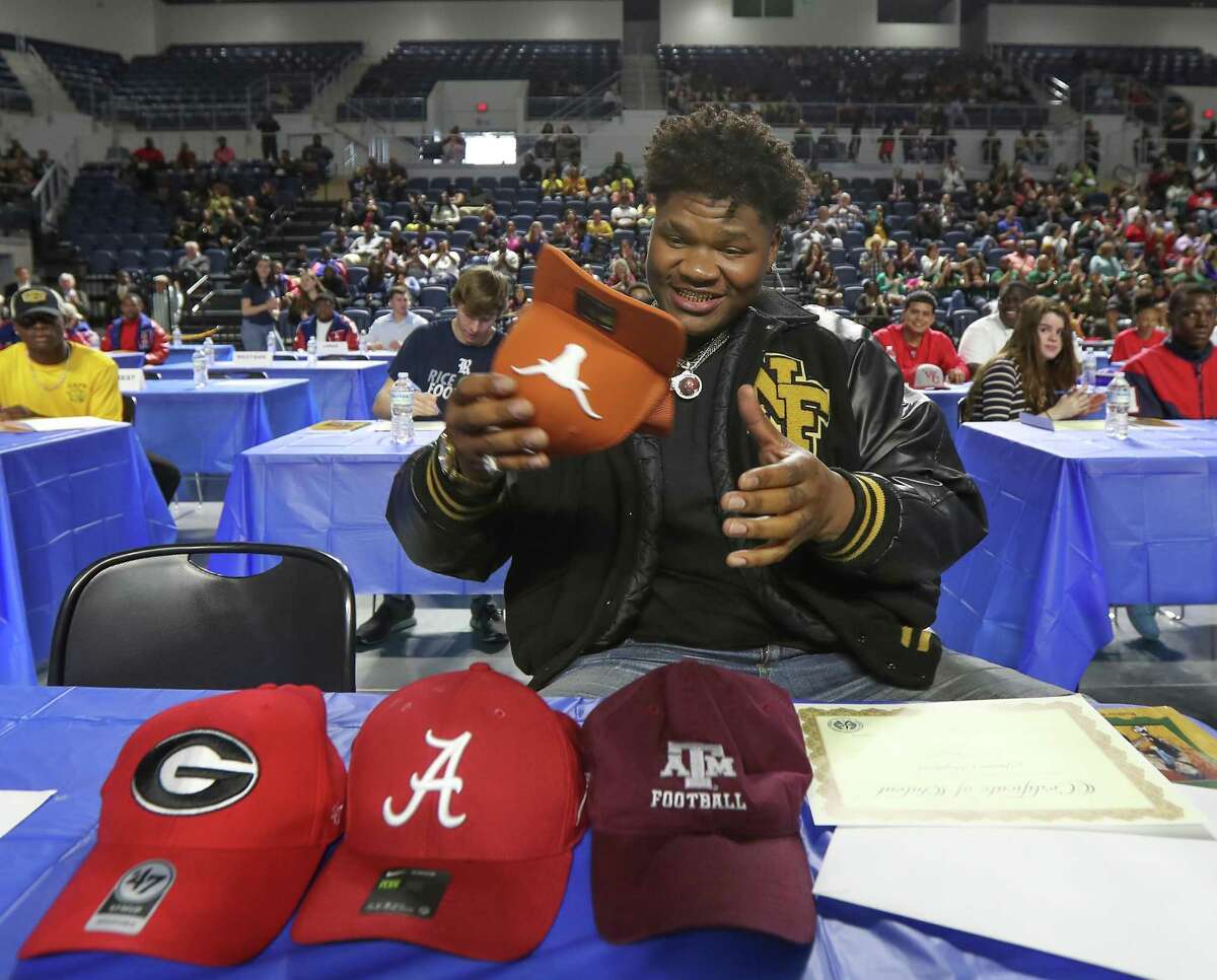 North Forest football standout Javonne Shepherd makes Texas his national signing day pick at Delmar Stadium on Wednesday.