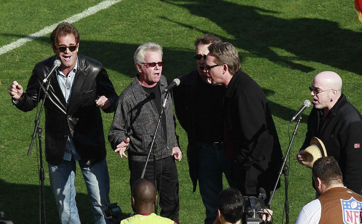 Huey Lewis and the News perform the national anthem before an NFL divisional playoff football game between the San Francisco 49ers and the New Orleans Saints on Saturday, Jan. 14, 2012, in San Francisco. (AP Photo/Jeff Chiu)