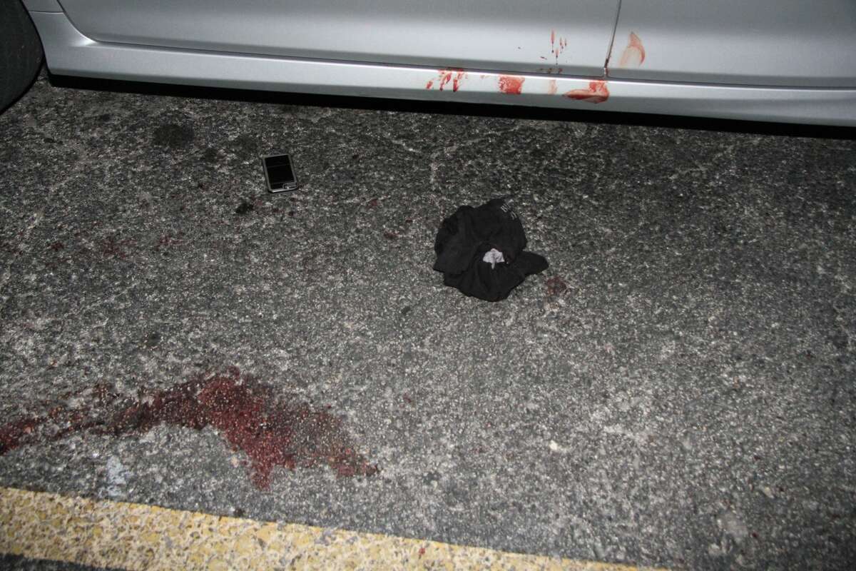 Graphic crime scene photos show aftermath of gun battle outside strip ...
