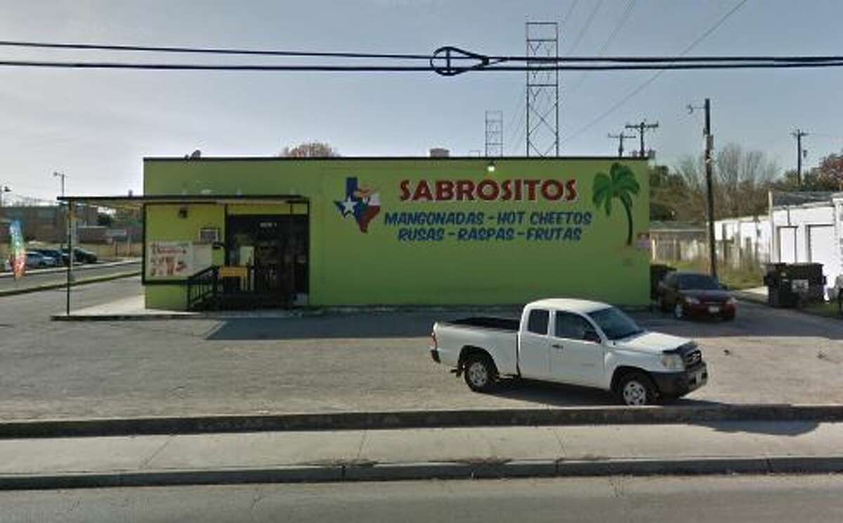 Sabrositos Snack and Fruit Cups: 2201 Vance Jackson Date: 08/12/2019 Score: 66 Highlights: Inspectors observed “spoiled food” on the shelves of the walk-in cooler. Rodent droppings were found near the rear door, while dead roaches were seen behind equipment. Staff were not wearing effective hair restraints. Several rags were found in a bucket, along with “a roach floating in the water.” Several cut food items such as tomatoes and lettuce were stored directly on a soiled storage rack. Several holes were seen throughout the establishment. The hot water on the three-compartment sink was shut off.    Several utensils had debris buildup, while several “soiled items” were being kept in a box near the prep station. The storage appeared long term. Staff opened and closed walk-in doors, then resumed food preparation without washing their hands. Employees were dicing strawberries with bare hands. There were no gloves available at the time of inspection. Pesticides for residential-use only were found on the premises. There was a rusty shelf in the walk-in cooler that needed to be replaced or painted. 