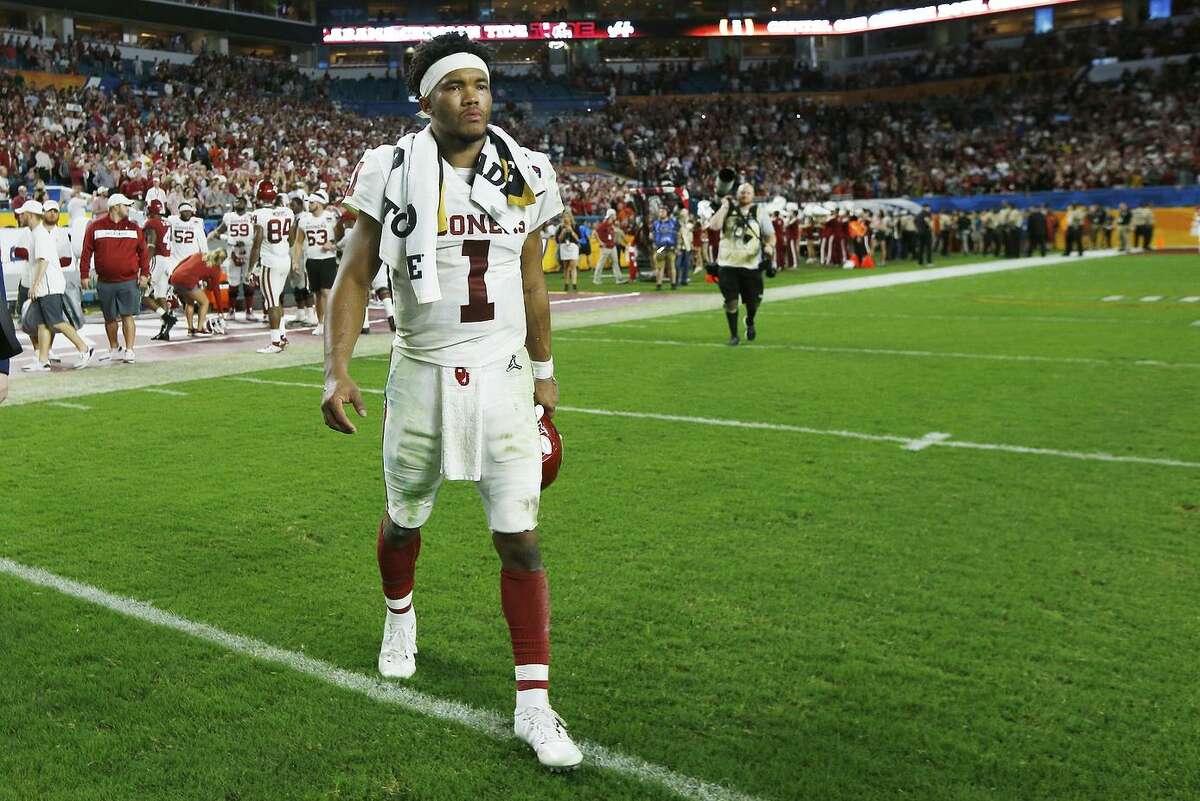 Quarterback Kyler Murray walks off the field after Oklahoma lost to Alabama in the Orange Bowl in December.