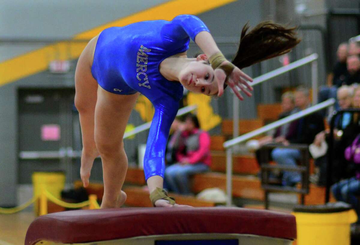 SCC gymnastics championship action at Jonathan Law in Milford, Conn., on Saturday Feb. 7, 2019.