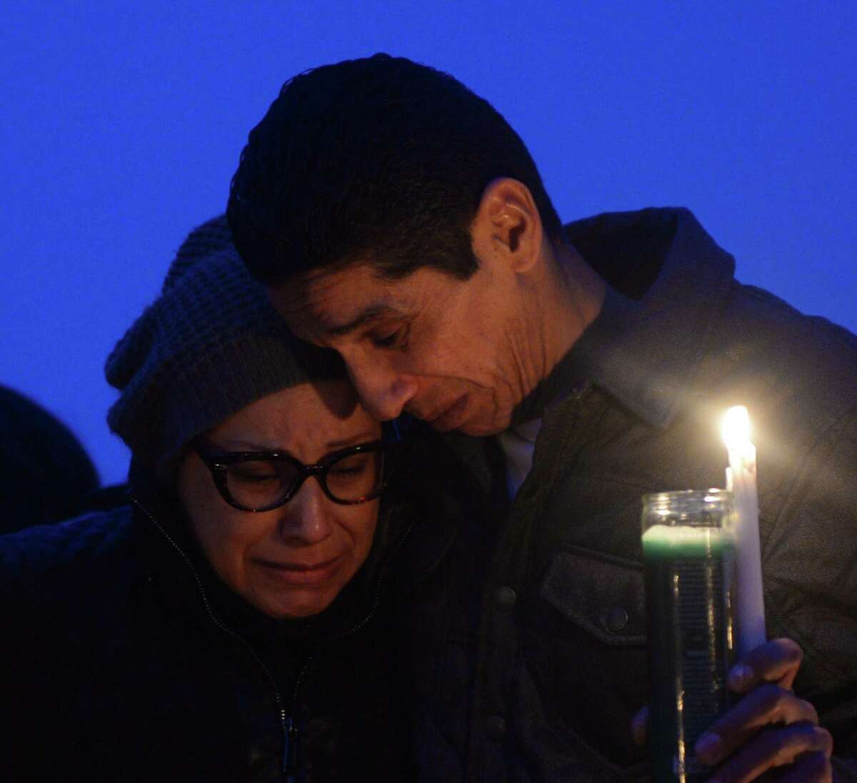 Friends and family grieve for homicide victim Valerie Reyes during a candleight vigil in her honor at Glen Island Park in New Rochelle, N.Y. Thursday, Feb. 7, 2019. Reyes, 24, of New Rochelle, N.Y., was found bound inside of a suitcase just off of Glenville Road in a quiet, wooded area of Greenwich, Conn. on Tuesday morning.