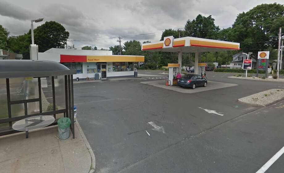 Driver gets stuck under own vehicle in gas station mishap ...