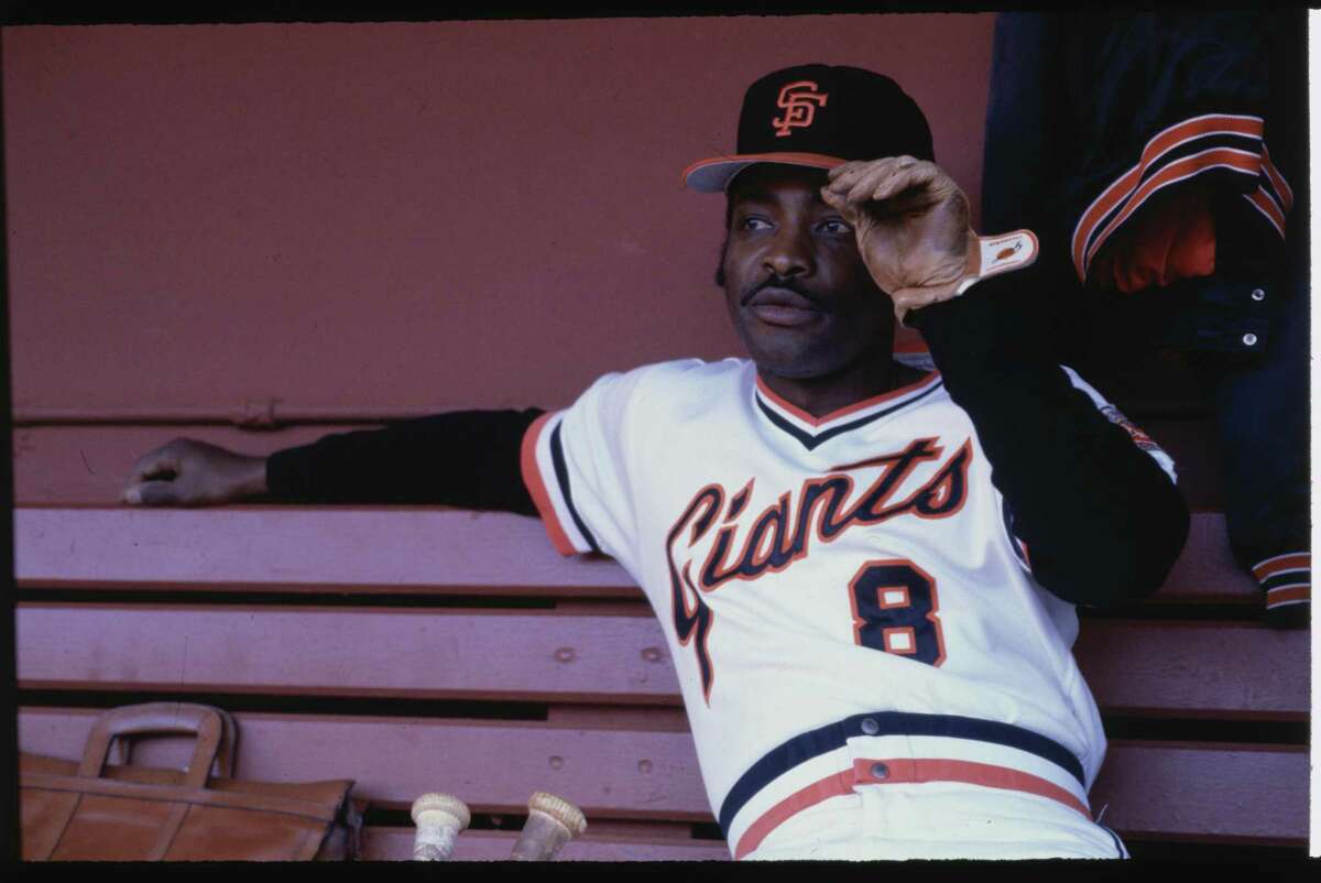 (Original Caption) The San Francisco Giants' Joe Morgan sits in the dug out and adjusts his hat during a practice session.