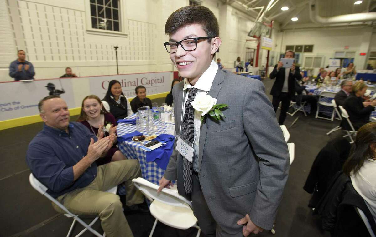 Michael Rincon, a senior at Greenwich High School, reacts with a smile after he is introduced as Youth of the Year during the Boys and Girls Club of Greenwich YOY dinner on Thursday, Feb. 7, 2019 in Greenwich, Connecticut.