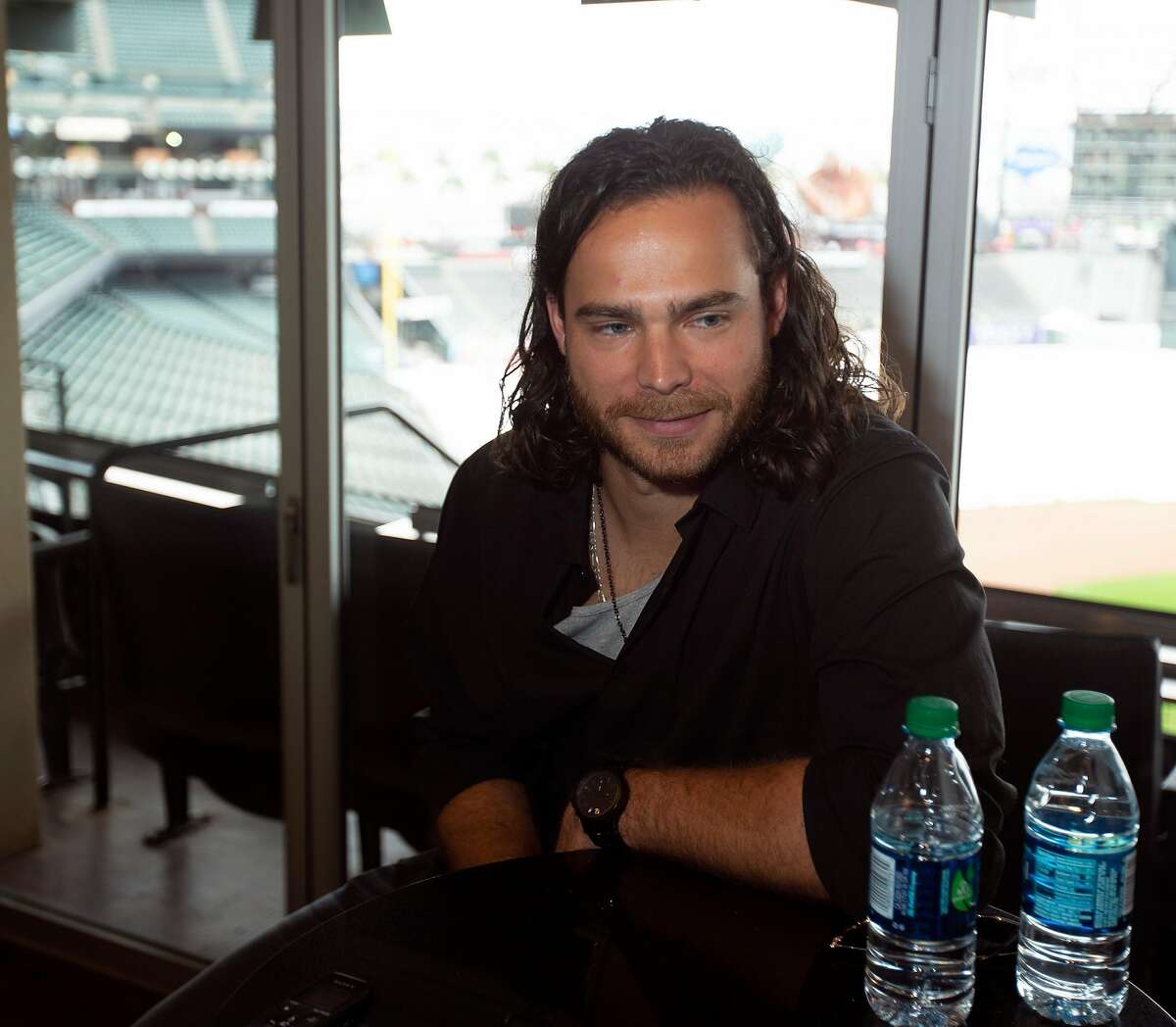 Shortstop Brandon Crawford talks to reporters at the San Francisco Giants media day, on Friday, Feb. 8, 2019 in San Francisco, Calif.