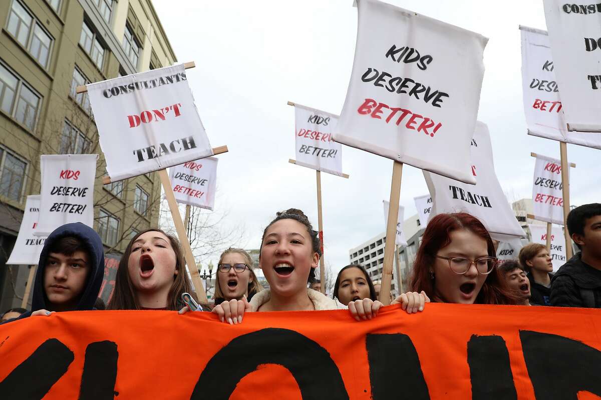 Students from Oakland Tech High School, participate in a protest on Broadway Ave. in Oakland, Calif., on Friday, February 8, 2019. Oakland Tech High School students are actively protesting to support Oakland Unified School Districts teachers who are threatening to strike if the district doesn't meet their contract demands.