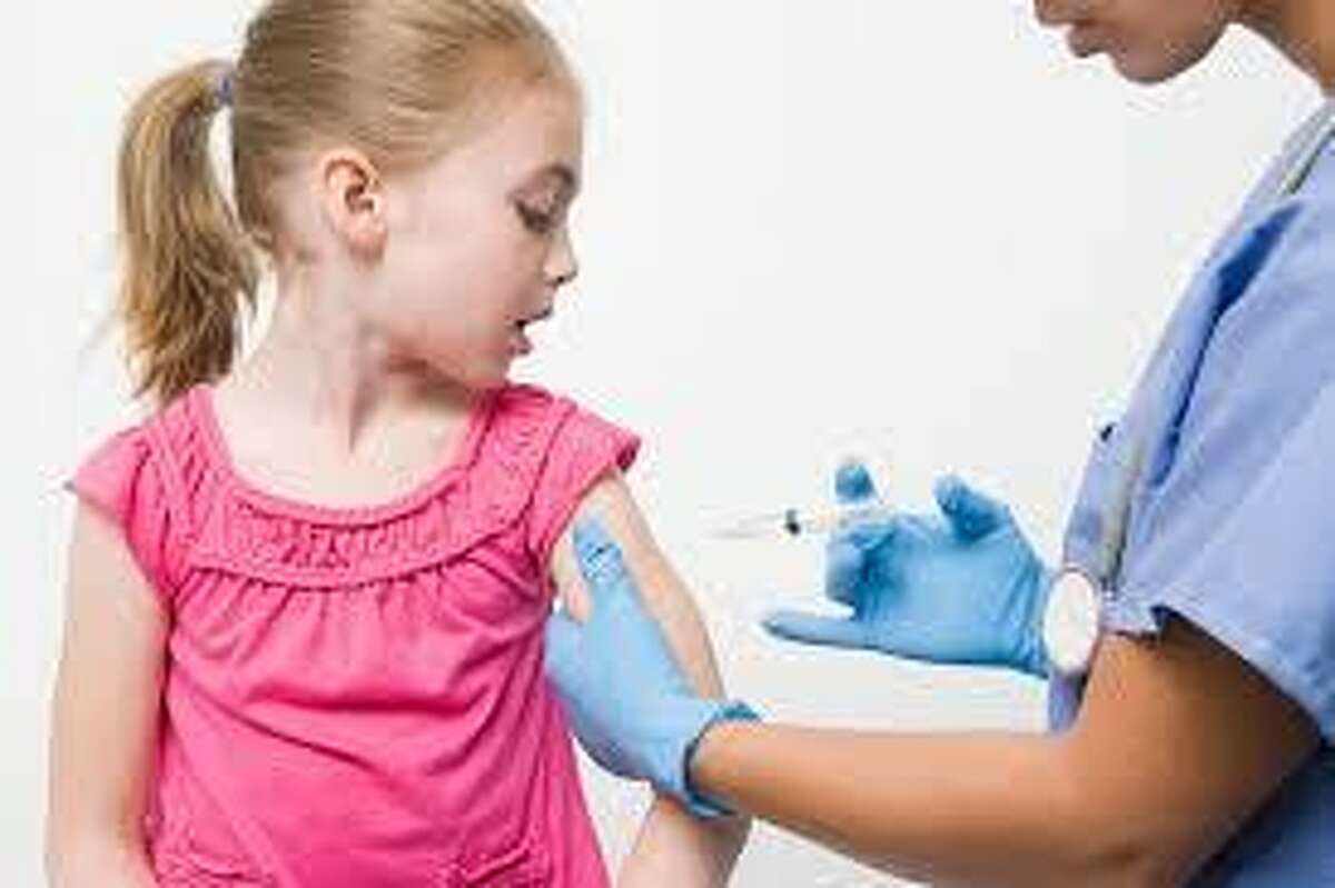 Children who get their school shots could be infected with measles or other childhood diseases by children with waivers.