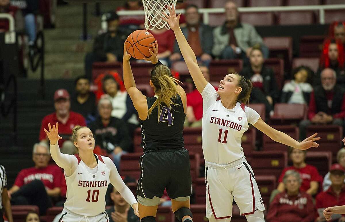 Stanford's Alanna Smith puts pressure on Washinton's Amber Melgoza during an NCAA college basketball game, Friday, Jan. 18, 2019, in Stanford, Calif. (AP Photo/Tomas Ovalle)