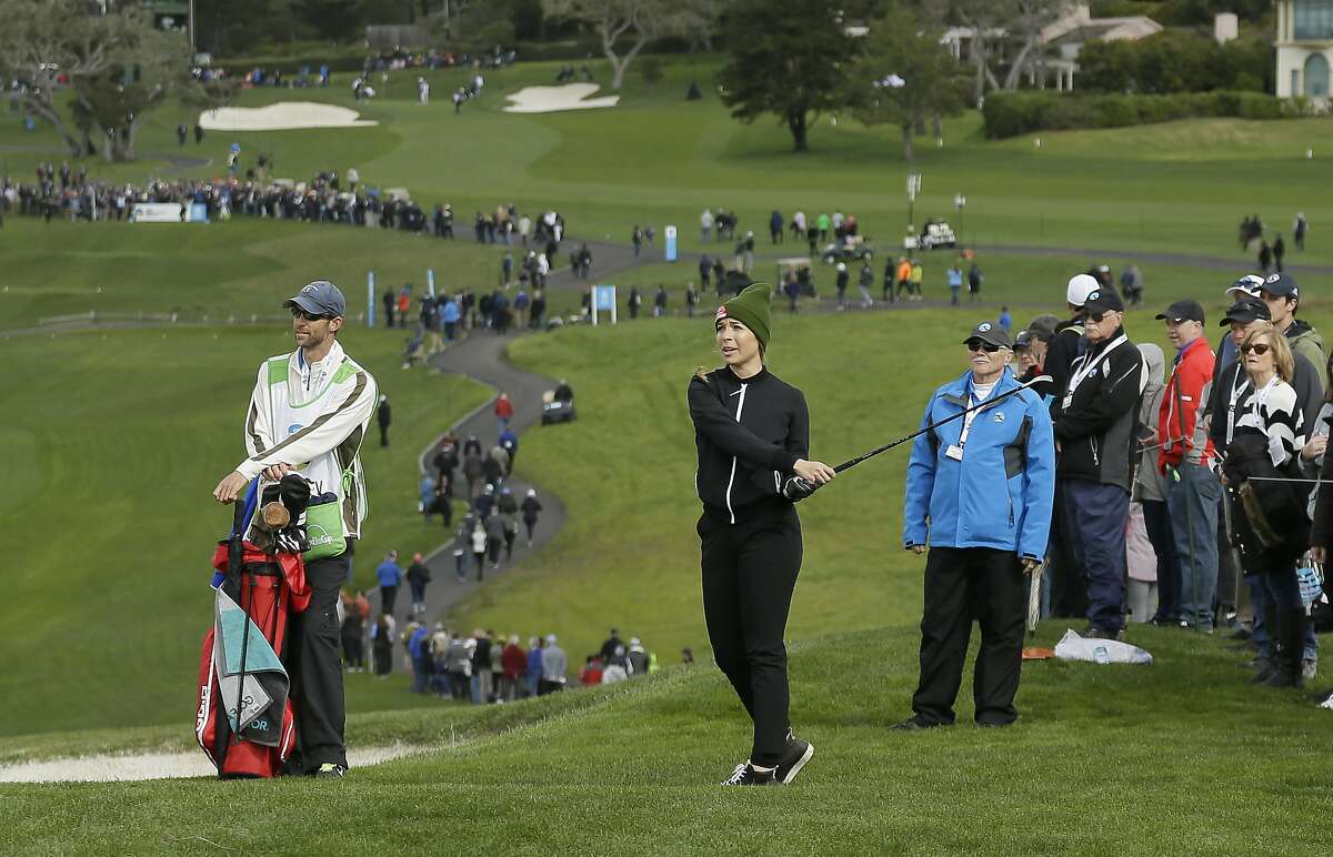 Kira Kazantsev follows her approach shot to the sixth green of the Pebble Beach Golf Links during the third round of the AT&T Pebble Beach Pro-Am golf tournament Saturday, Feb. 9, 2019, in Pebble Beach, Calif. (AP Photo/Eric Risberg)