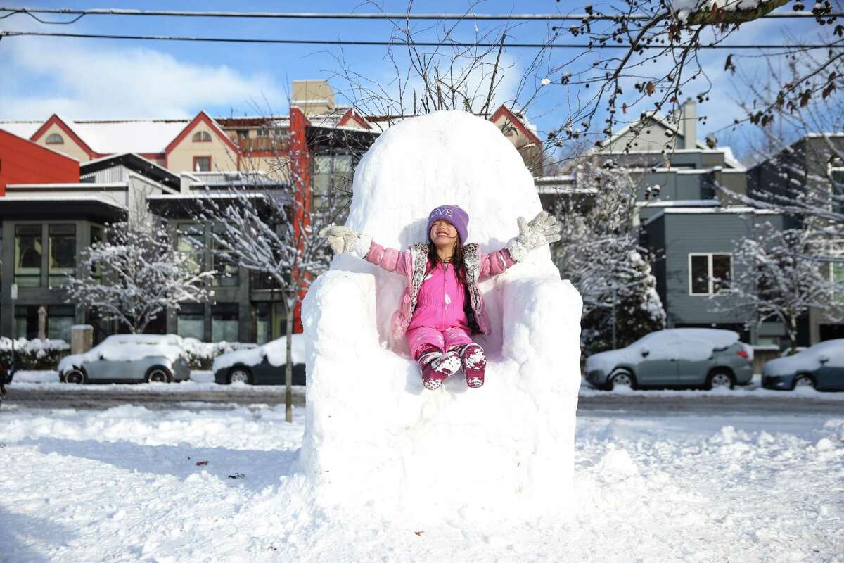 Aria Chen, 6, declares herself Queen in a snow Iron Throne as Seattlites enjoy the fresh snow at Cal Anderson Park after the city got up to eight inches in some areas over Friday night and Saturday, Jan. 9, 2019.
