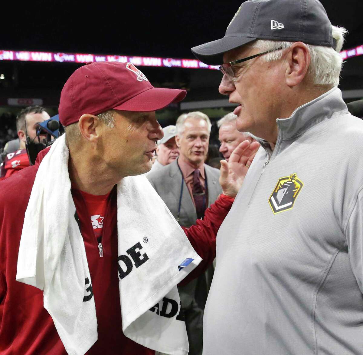 SanAntonio coach Mike Riley meets Fleet coach Mike Martz after the game as the Commanders host San Diego at the Alamodome in the opening game for the Alliance of American Football league on February 9, 2019.