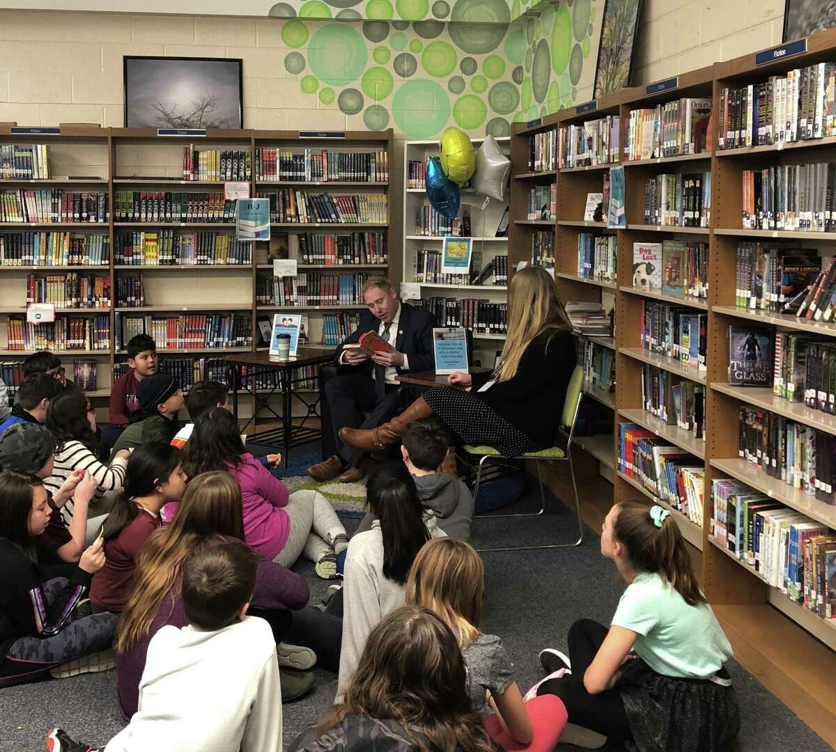 State Rep. Steve Harding, R-Brookfield, and his wife read to students at Bethel Middle School in honor of World Read Aloud Day on Feb. 1. Harding was among several elected officials to participate in the event.