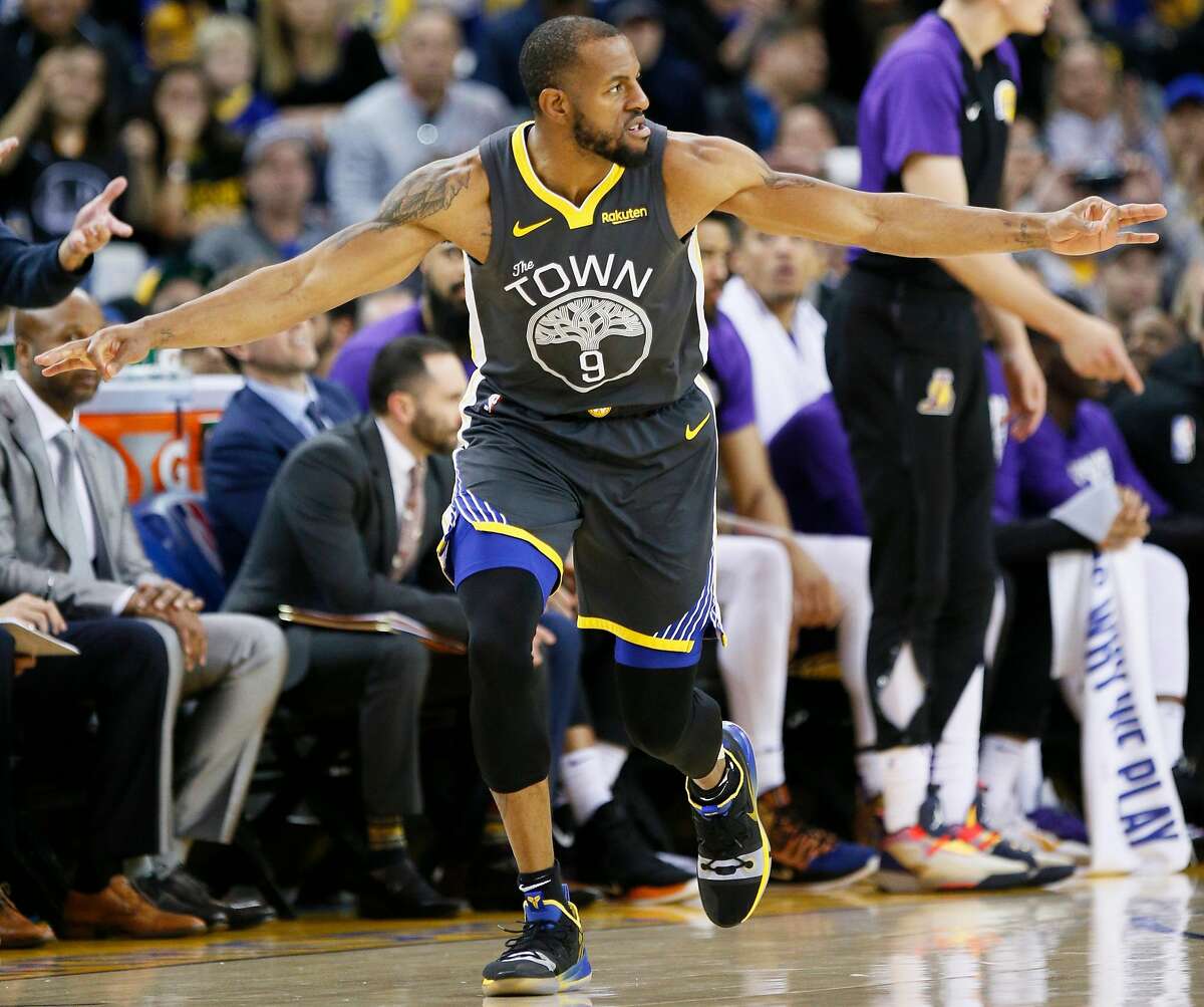 Golden State Warriors guard Andre Iguodala (9) after making a three point basket against the Los Angeles Lakers in the second half of an NBA game at Oracle Arena on Saturday, Feb. 2, 2019, in Oakland, Calif. The Warriors won 115-101.