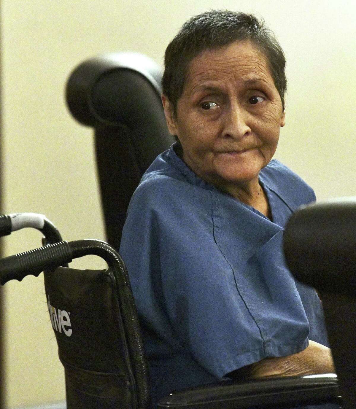 Beatrice Sampayo, 64, who is accused of helping cover up the death of her 8-month-old grandson, King Jay Davila, listens during a Friday hearing at which her bail was reduced from $250,000 to $50,000 by Judge Andrew Carruthers.