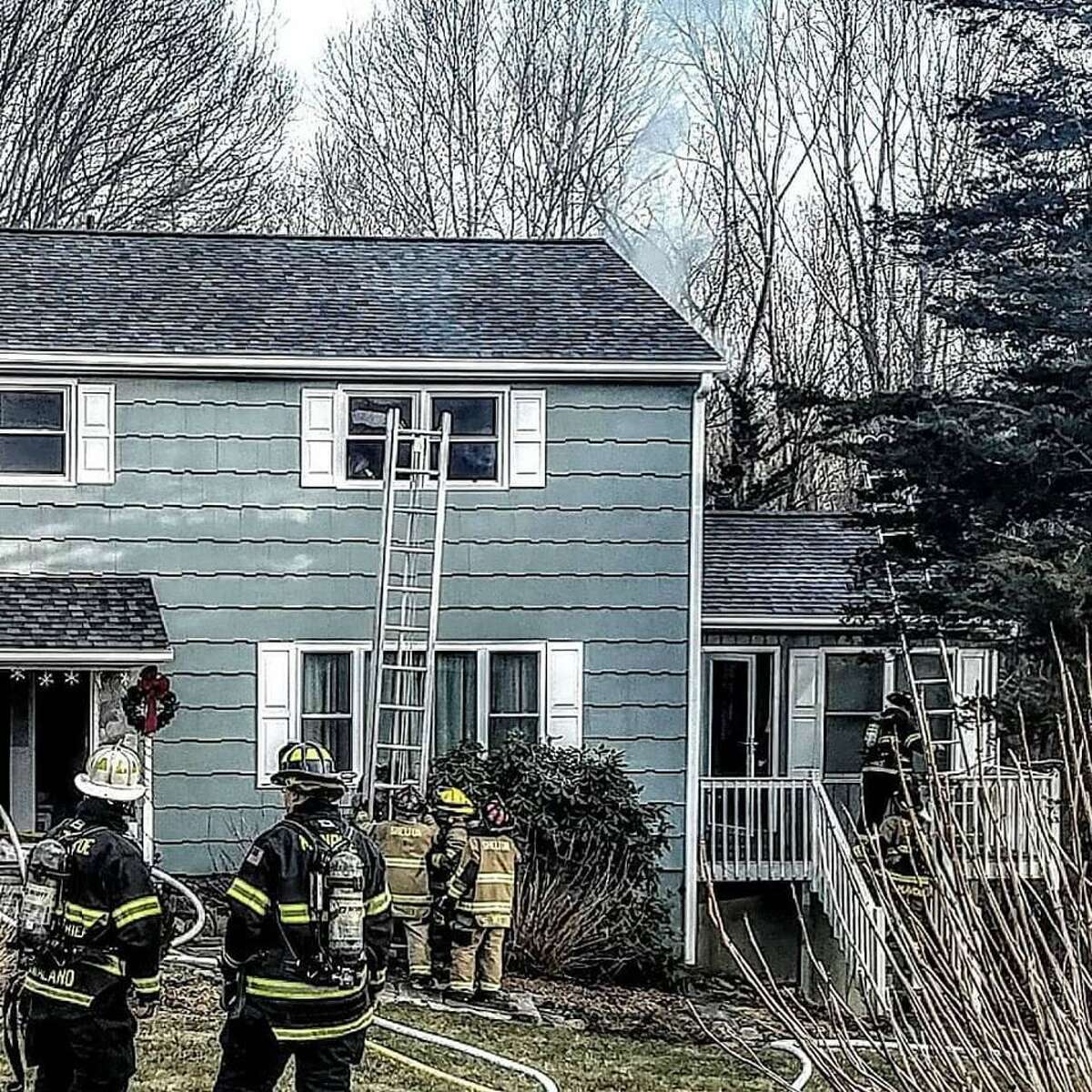 Shelton firefighters battled a blaze at a Gray Street home Feb. 10, 2019, that involved several crews, but no one was injured and damage was kept mostly to one part of the house.