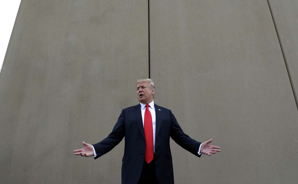 President Donald Trump speaks during a tour as he reviews border wall prototypes in San Diego.