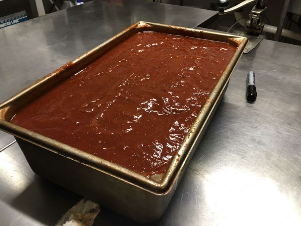 B-Daddy's makes the smoked house barbecue sauce in large batches that are cooked in the pit from start to finish for about five hours.
