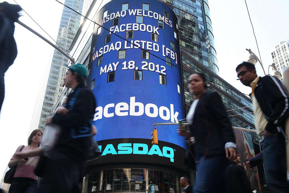 LE - JULY 31: Shares of Facebook rose above the $38 initial public offering price July 31, 2013 for the first time since it went public in May of 2012. NEW YORK, NY - MAY 18: The Nasdaq board in Times Square advertises Facebook which is set to debut on the Nasdaq Stock Market today on May 18, 2012 in New York, United States. The social network site is set to begin trading at roughly 11:00 a.m. ET and on Thursday priced 421 million shares at $38 each. Facebook, a Menlo Park, California based company, will have a valuation exceeding $100 billion. (Photo by Spencer Platt/Getty Images)
