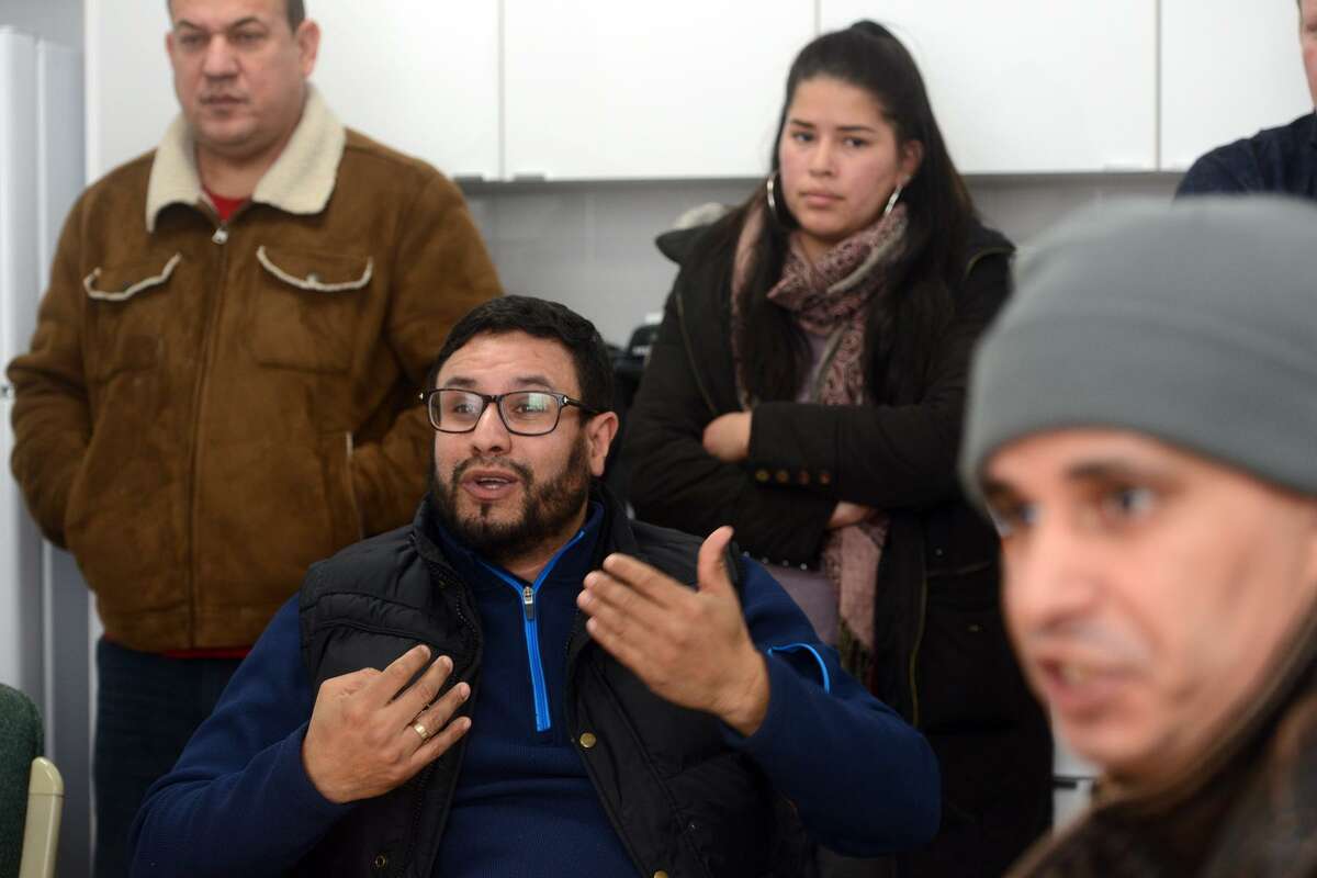 Mourad Hassar, of West Haven, speaks about his recent frustrations as a driver for Uber and Lyft during a meeting with other drivers in New Haven, Conn. Feb. 6, 2019.