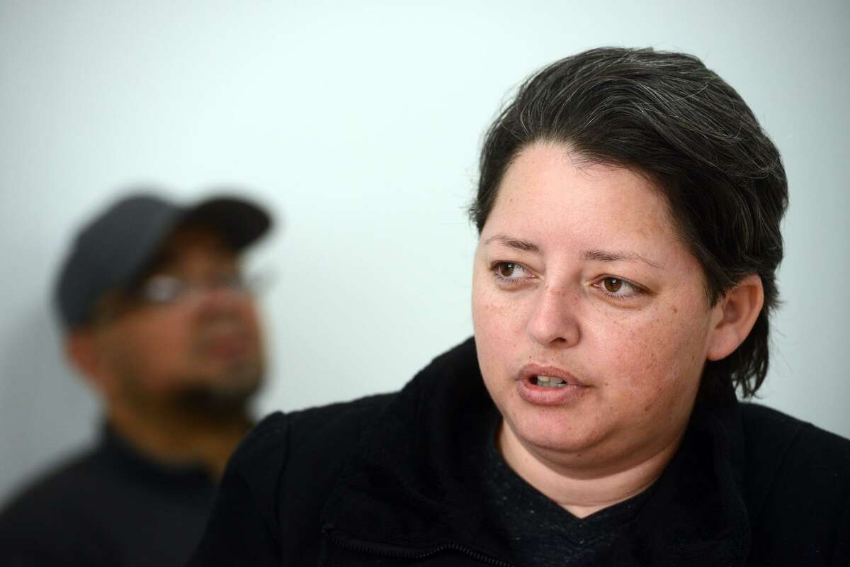 Rosanna Olan, of West Haven, speaks about her recent frustrations as a driver for Uber and Lyft during a meeting with other drivers in New Haven, Conn. Feb. 6, 2019.