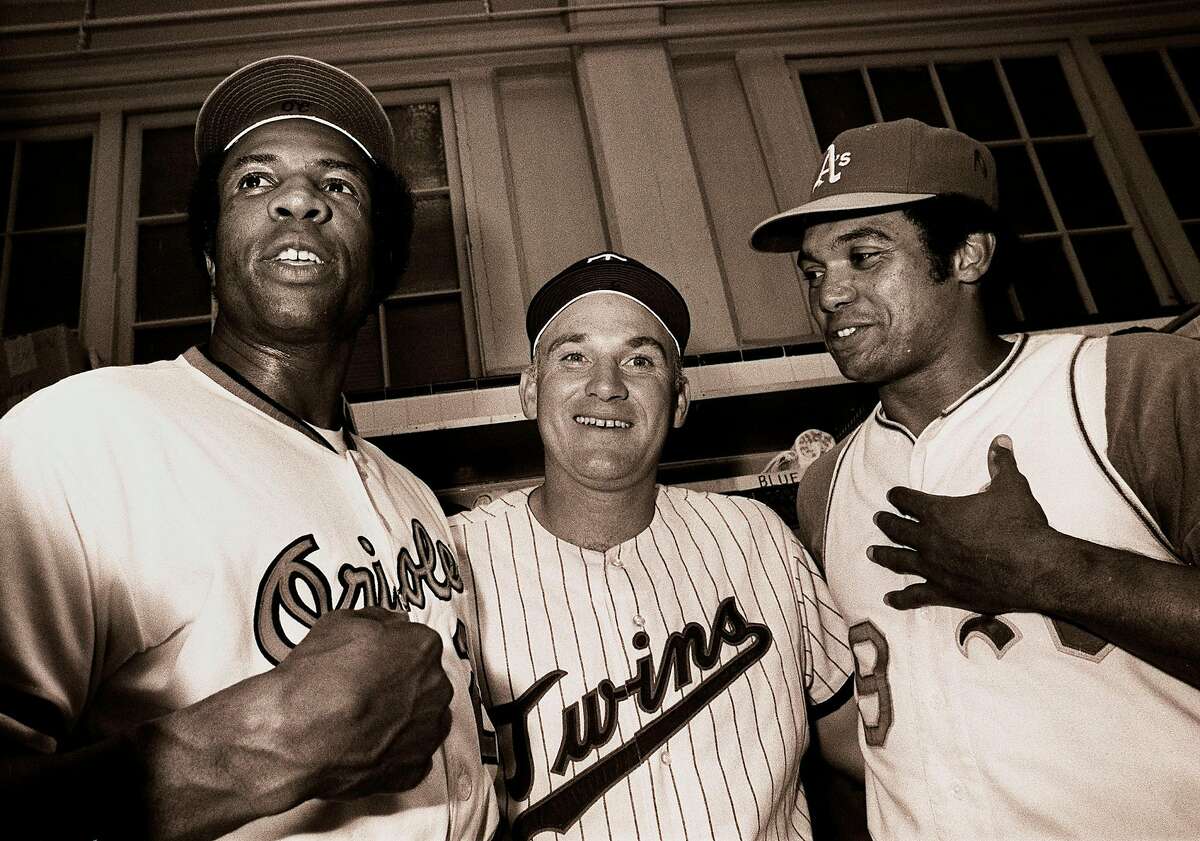 American League All Stars, from left, Baltimore Orioles' Frank Robinson, Minnesota Twins' Harmon Killebrew and Oakland Athletic's Reggie Jackson are all smiles in the clubhouse after their home runs help beat the National League 6-4 in this July 13, 1971 file photo in Detroit. (AP Photo)