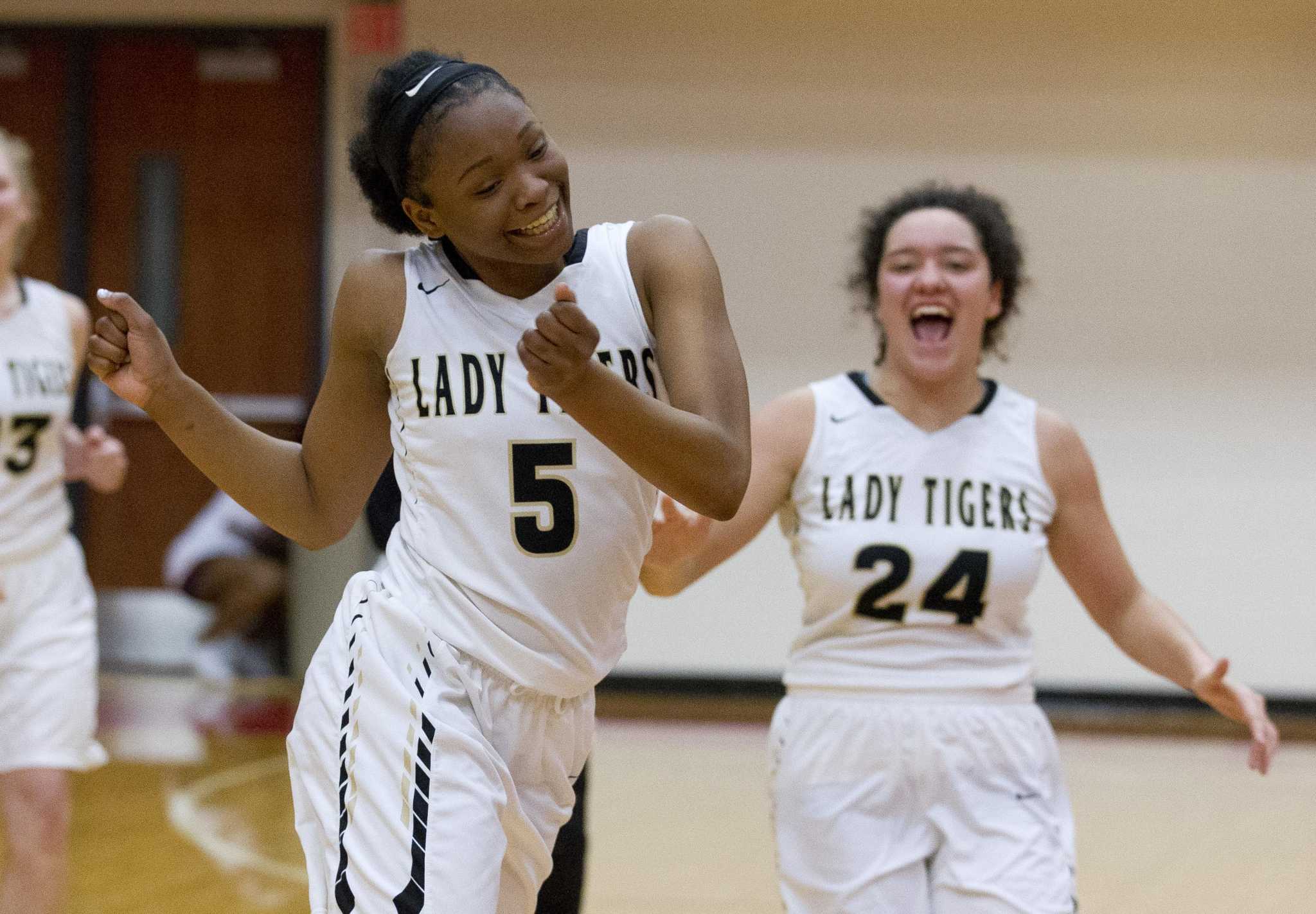 GIRLS HOOPS: Conroe holds off Davis for first playoff win since 2016