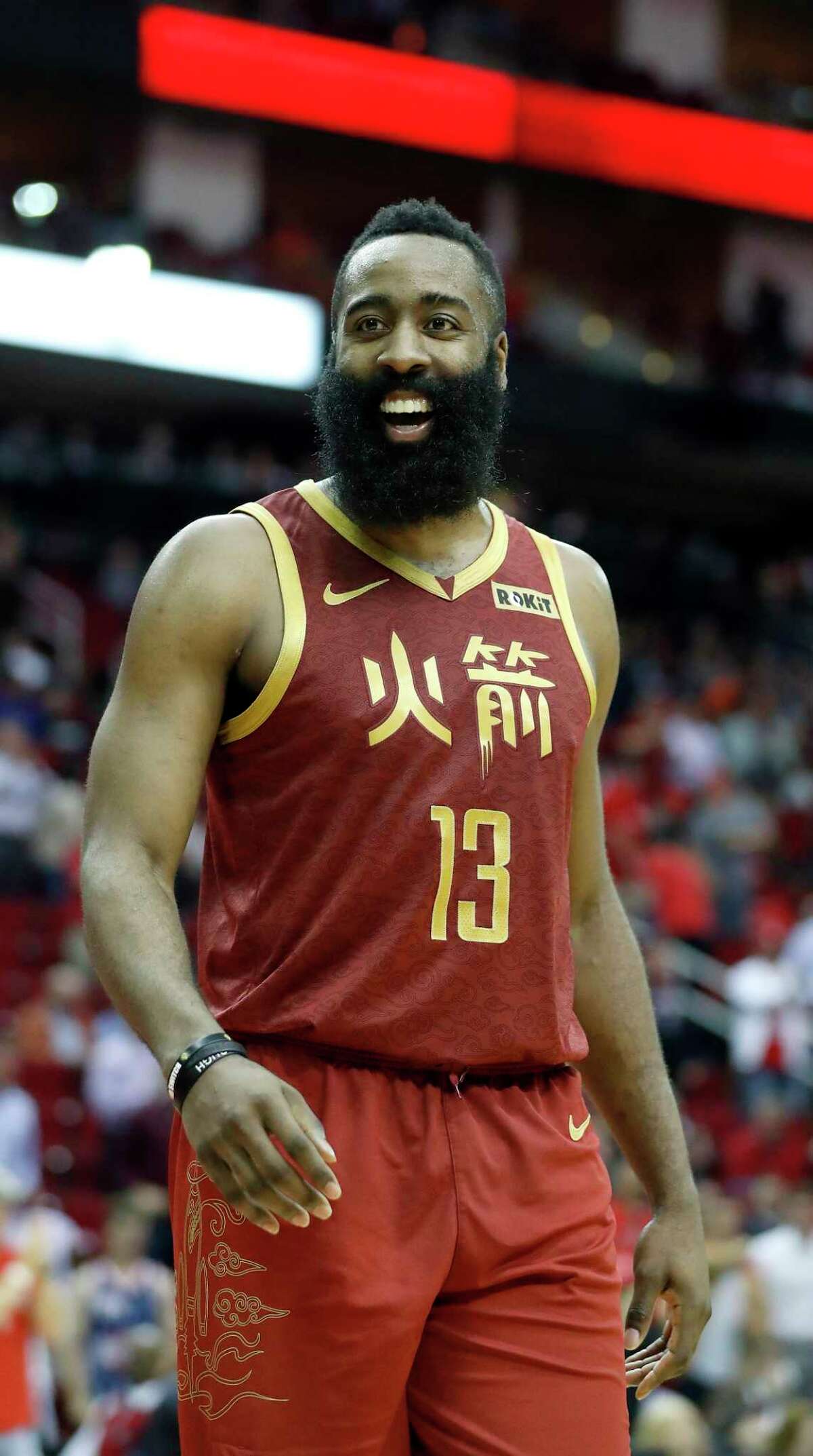 Houston Rockets guard James Harden (13) smiles in the final minute of play during the second half of an NBA game at the Toyota Center, Monday, Feb. 11, 2019, in Houston.