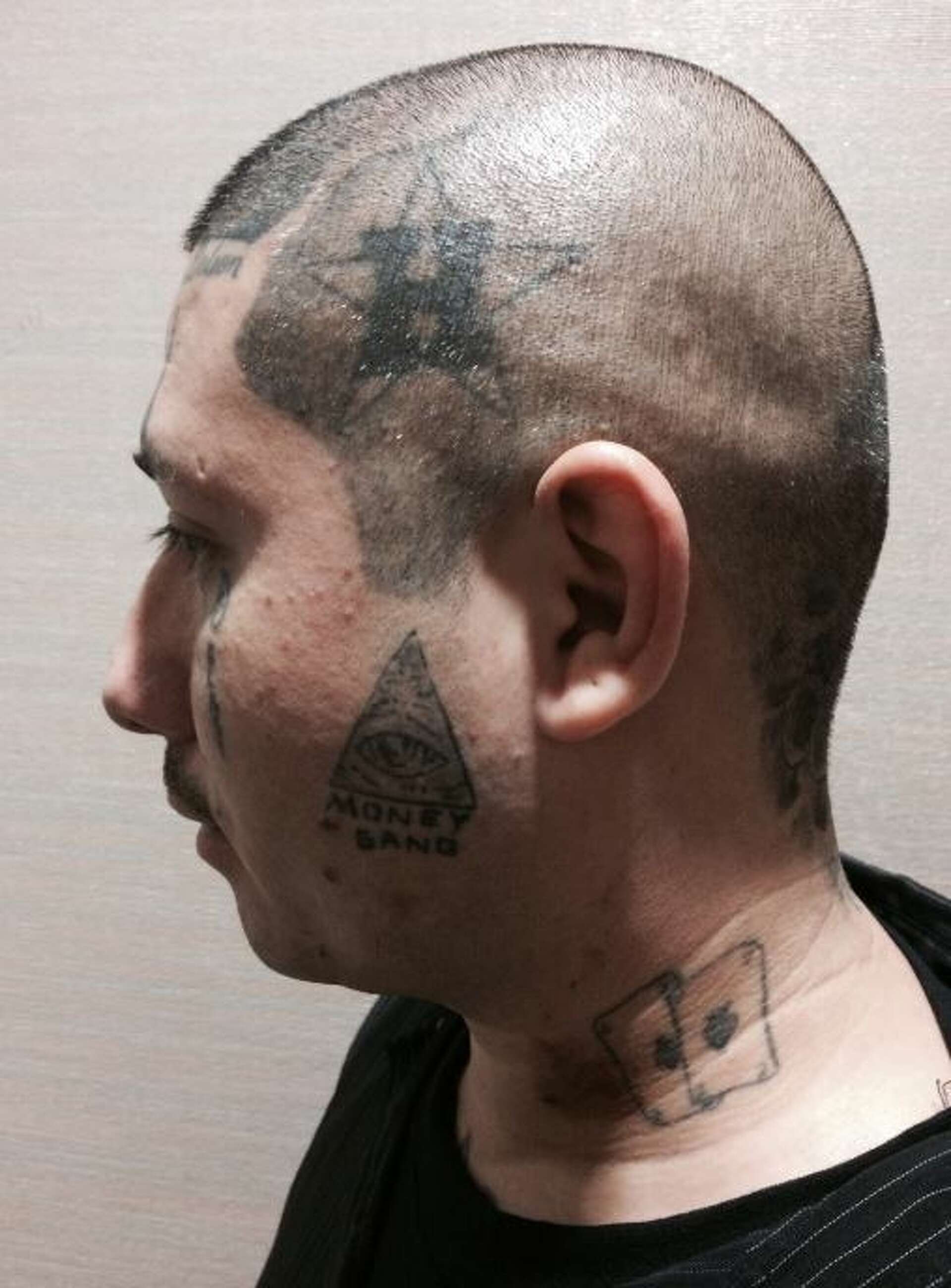 Photos: Houston face tattoos sometimes depict gang affiliation, others  express devotion, image size:1920x2600